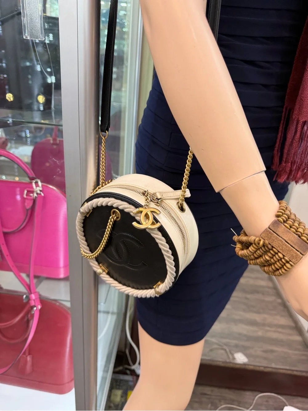 CHANEL Black Round Leather Crossbody with Cream Rope and Gold Hardware